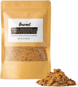 Main Amazon Image of spice package in paper bag with pile of spice displayed outside of the package.